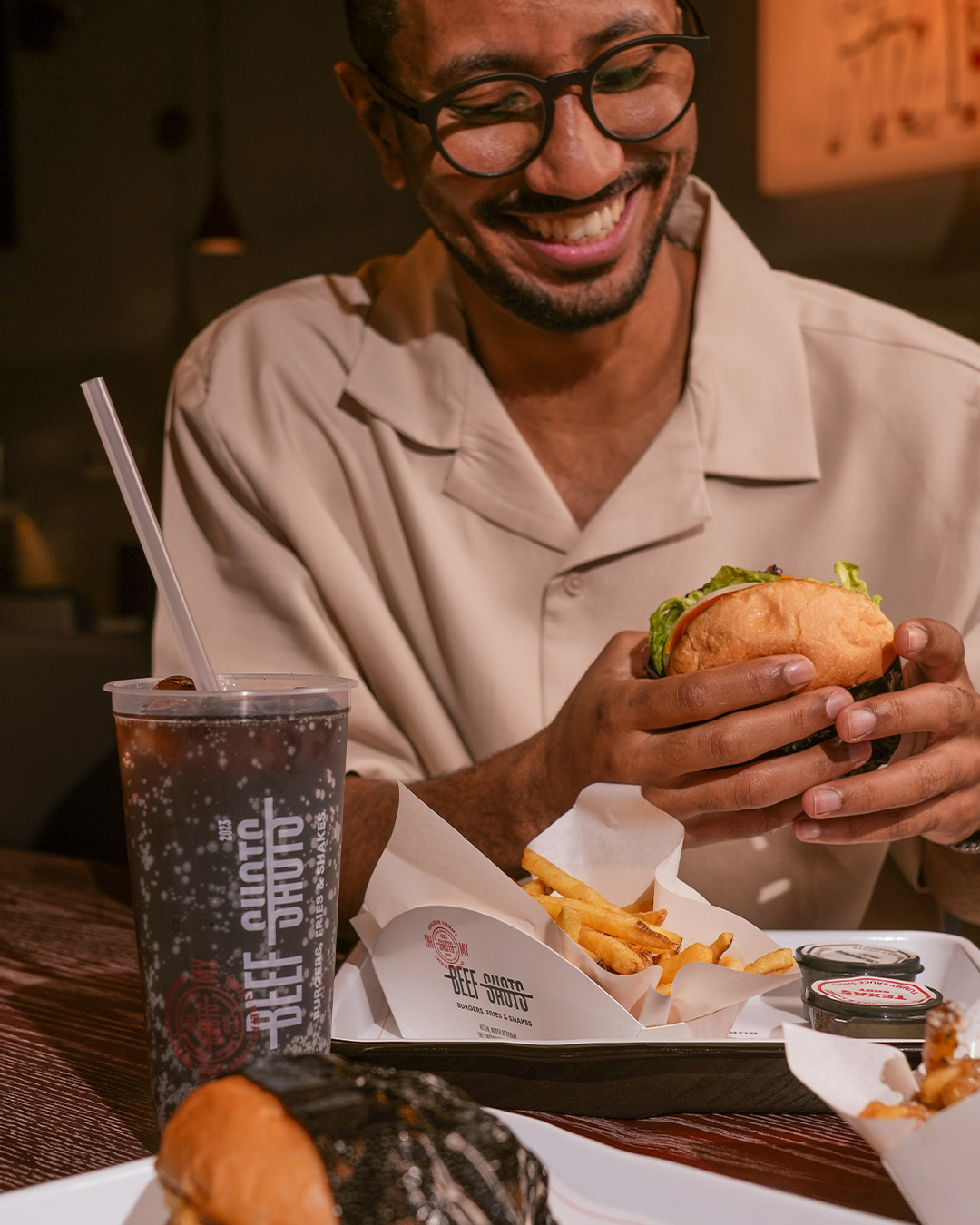 Enjoying a California Burger at Beefshots Riyadh