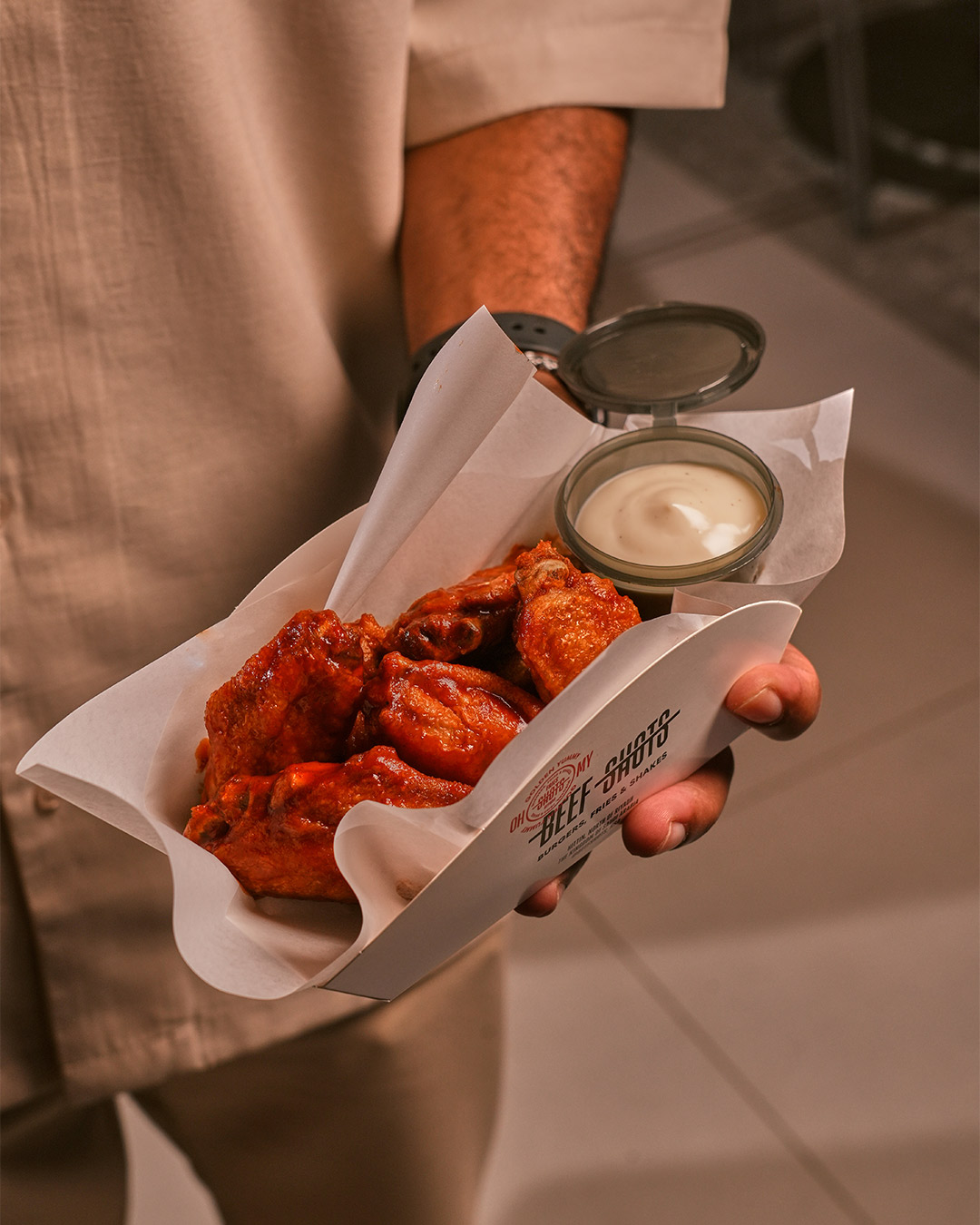 Interior view of Beefshots Burger restaurant in An Narjis, Riyadh – modern seating for burger lovers